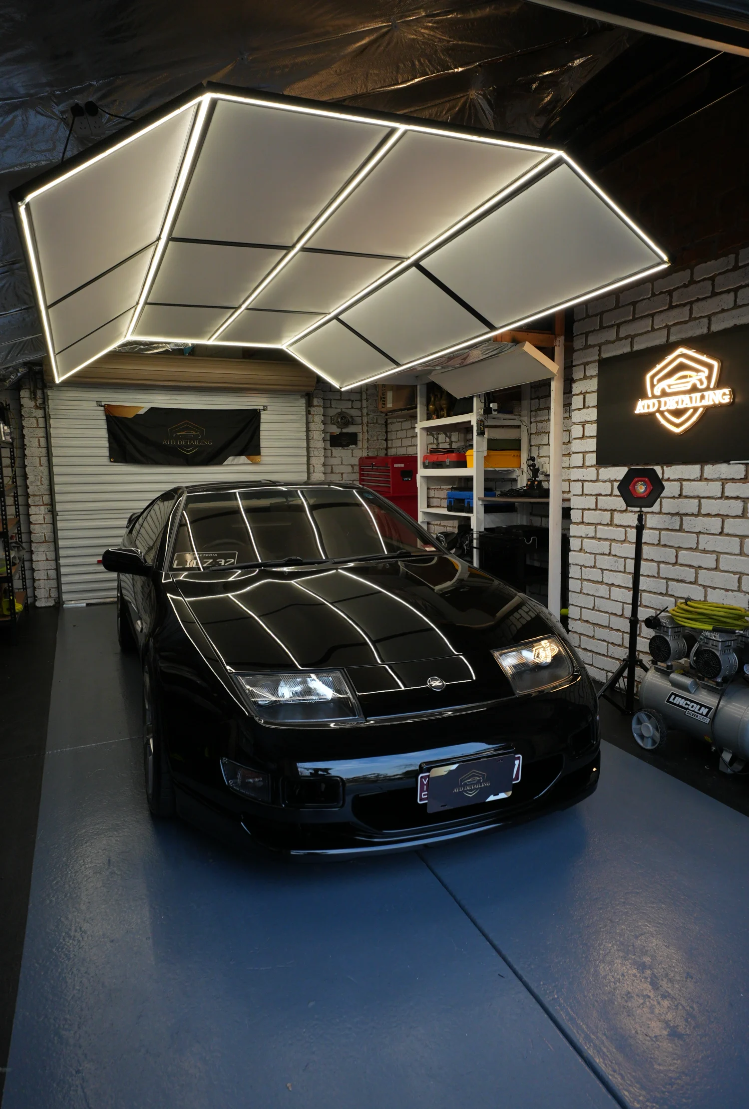 300ZX with the ATD Detailing neon sign in the studio