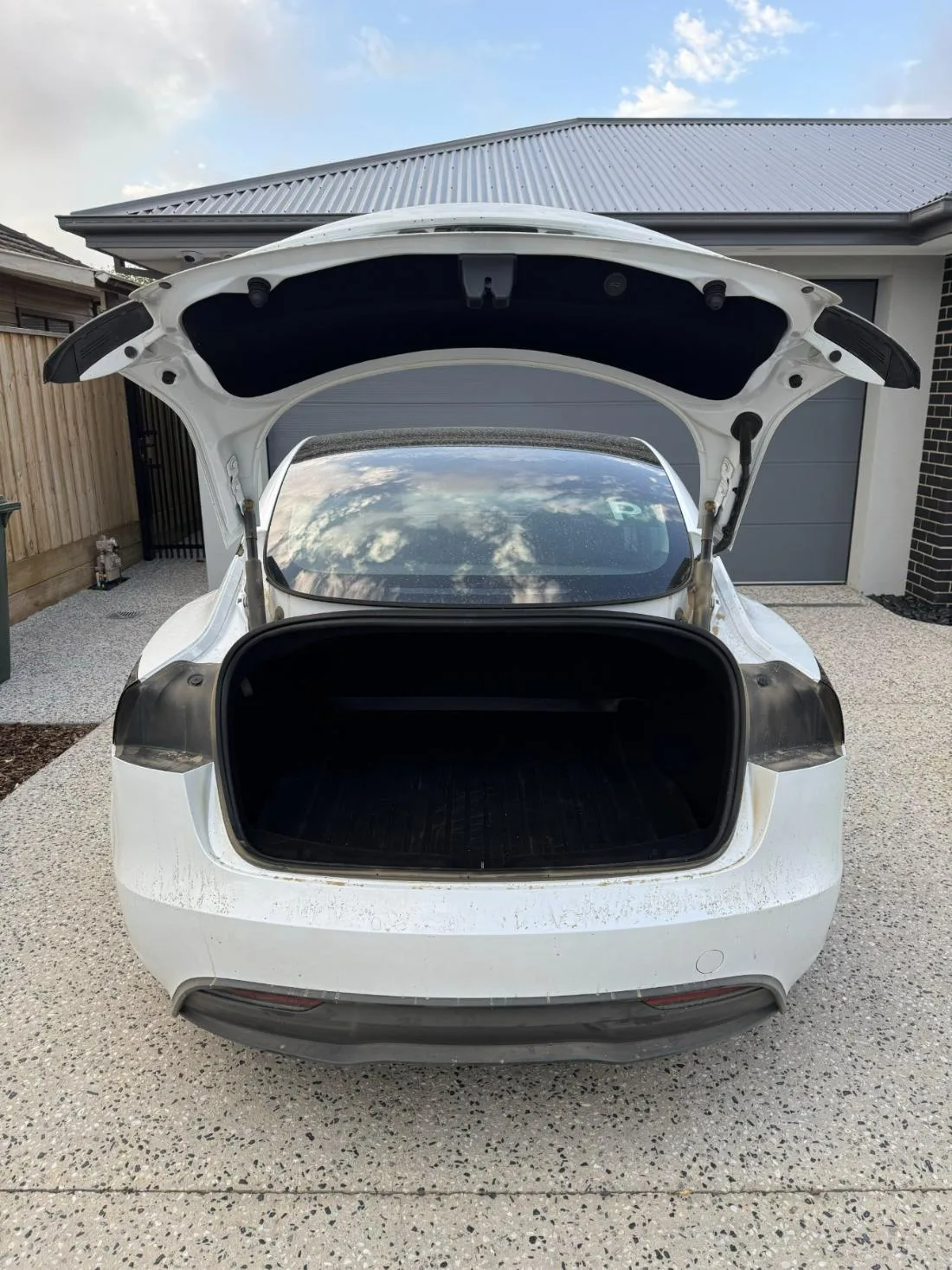 Exterior detail · Tesla boot and boot jamb before